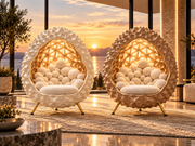 Cream white and warm neutral fiberglass durian cocoon chairs with gold legs in a luxury interior