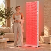 iLuxred X7000 white full-body red light therapy panel shown at true scale in a luxury home